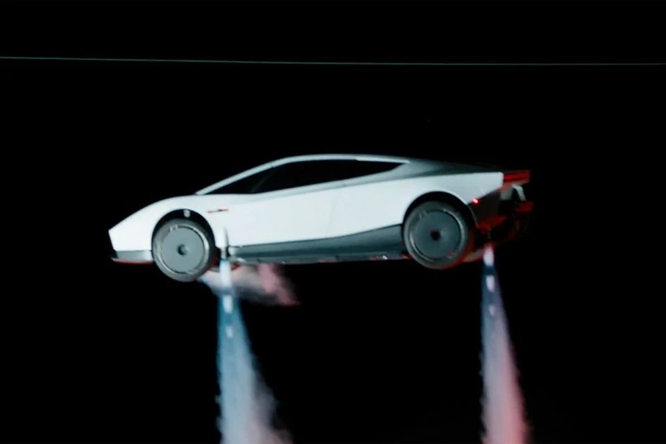 16-1792133464-elon-musk-trinh-lang-tesla-roadster-sieu-xe-bay-dap-dat-nhe-tenh-sau-man-nhao-lon-tren-khong